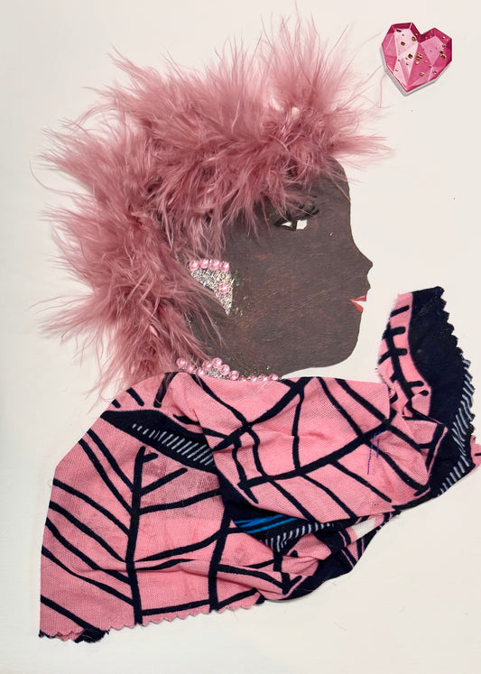 A woman has blush pink hair and wears a pink blouse. The blouse has a black geometric striped pattern.  She wears sparkling silver jewellery with pink gems. In the upper right corner, there is a pink heart.