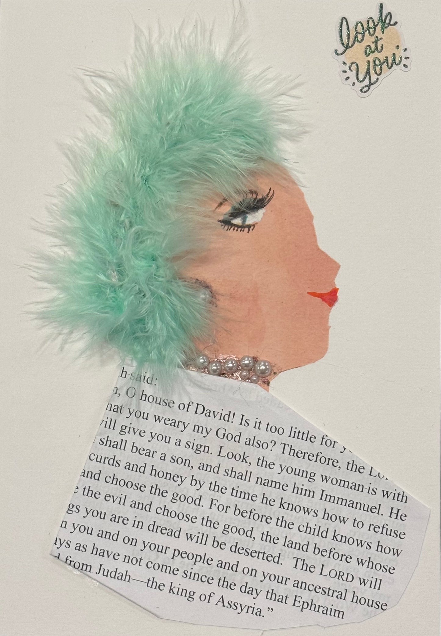 Handmade greeting card that can double as a piece of art featuring a side-profile collage of a woman with a fluffy mint-green feather headpiece covering the back of her head. She wears a pearl necklace and has soft makeup with long lashes. A piece of printed text forms part of her clothing, and the background is plain.