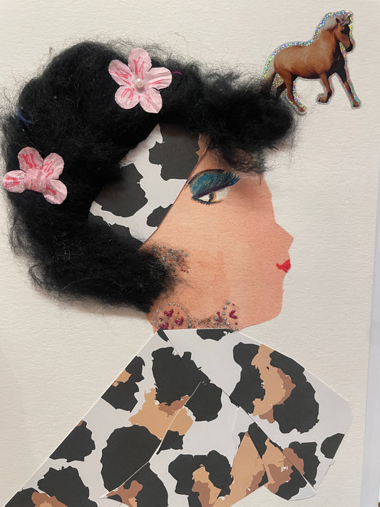 This is a handmade card of a woman named Friendly Felicity, featuring black textured hair with pink paper flowers, a black-and-white patterned outfit, and sparkly pink and silver jewellery on her neck and ear. A striking horse is found in the top right corner.