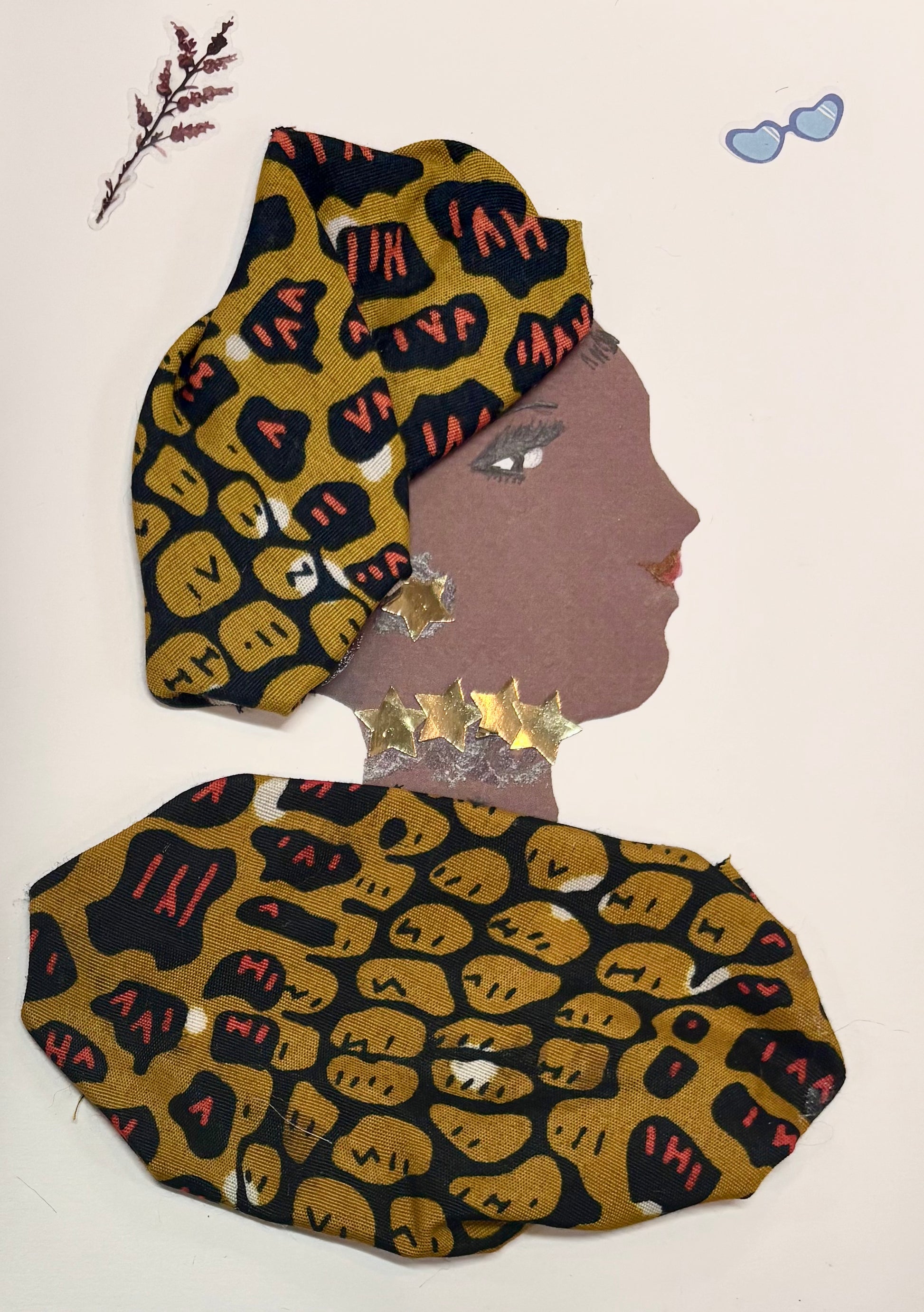 Golden Gracie dazzles in her bold, patterned attire of mustard and black, adorned with shimmering golden stars. Her poise and confident side gaze suggest elegance and inner strength, perfectly matched by the tiny sunglasses and botanical details dancing above her.