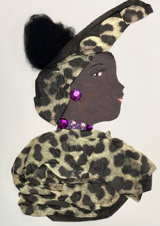 I handmade this card of a woman named Lady Moorgate. She’s shown in profile with defined lashes, red lips, and voluminous black textured hair. Her outfit and high-wrapped headscarf are made from leopard-print fabric, and she’s adorned with bold purple and pink gemstones on her ear and neckline.