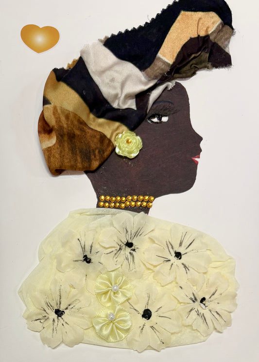 Marie Marigold glows with soft elegance and golden warmth. Her floral cream attire blossoms with delicate texture, echoing the golden bead choker at her neck. The rich, earth-toned headwrap, adorned with a pale yellow rosette, crowns her with grace, while her serene gaze radiates quiet dignity and timeless beauty.