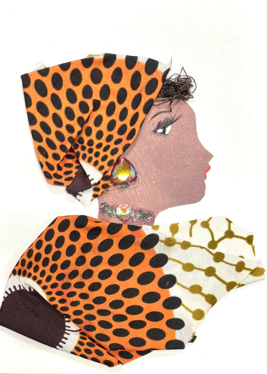 Handmade portrait of a woman in profile. She wears a bold orange and black polka-dot headwrap and a matching outfit with a mix of white and gold patterned fabric. Her jewellery includes large iridescent gems on her ear and neck.