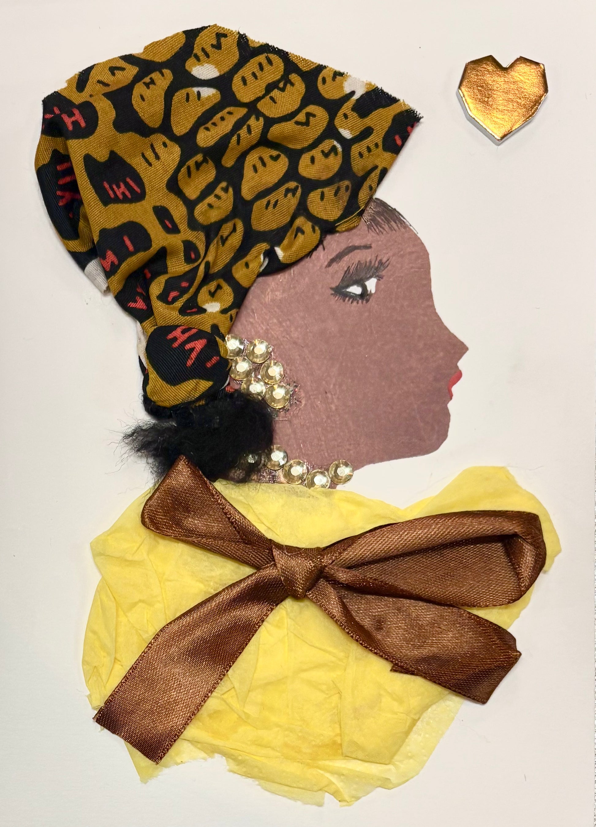 I handmade this card of a woman named Primrose Yellow. She wears a golden-patterned headwrap and a yellow outfit finished with a shiny brown bow. Her jewelry sparkles with round gems, and a golden heart shines beside her.