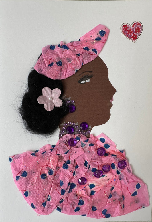 I made this handmade card of Piccadilly Patty who is wearing a pink blouse and hair piece that have blue and white sunglasses on them. Her hair is held up by a light-pink flower with a pearl-like bead in the center.