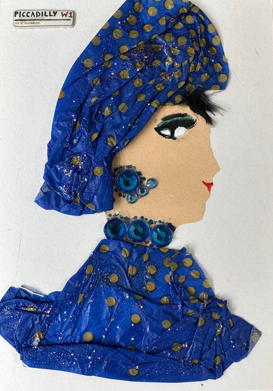 I made this handmade card of Piccadilly Priscilla. She is dressed in an elegant royal blue and gold outfit is paired with a royal blue gemstone necklace and earrings.