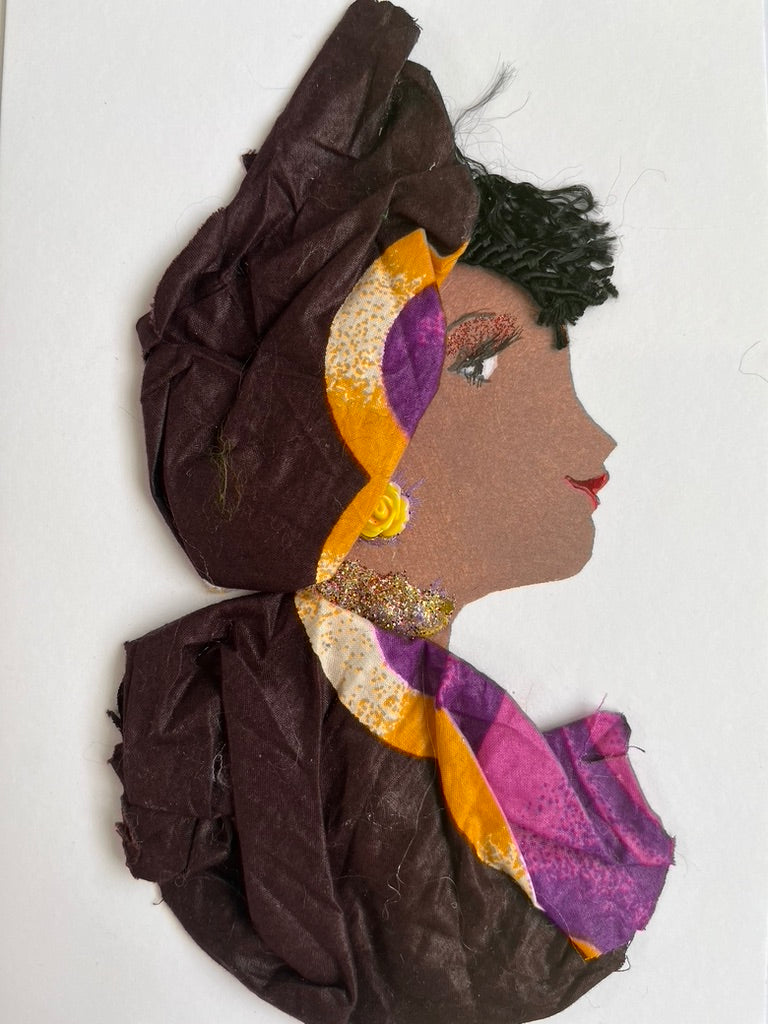This card is called Thea. She wears a purple headdress and blouse, and she has short black hair.