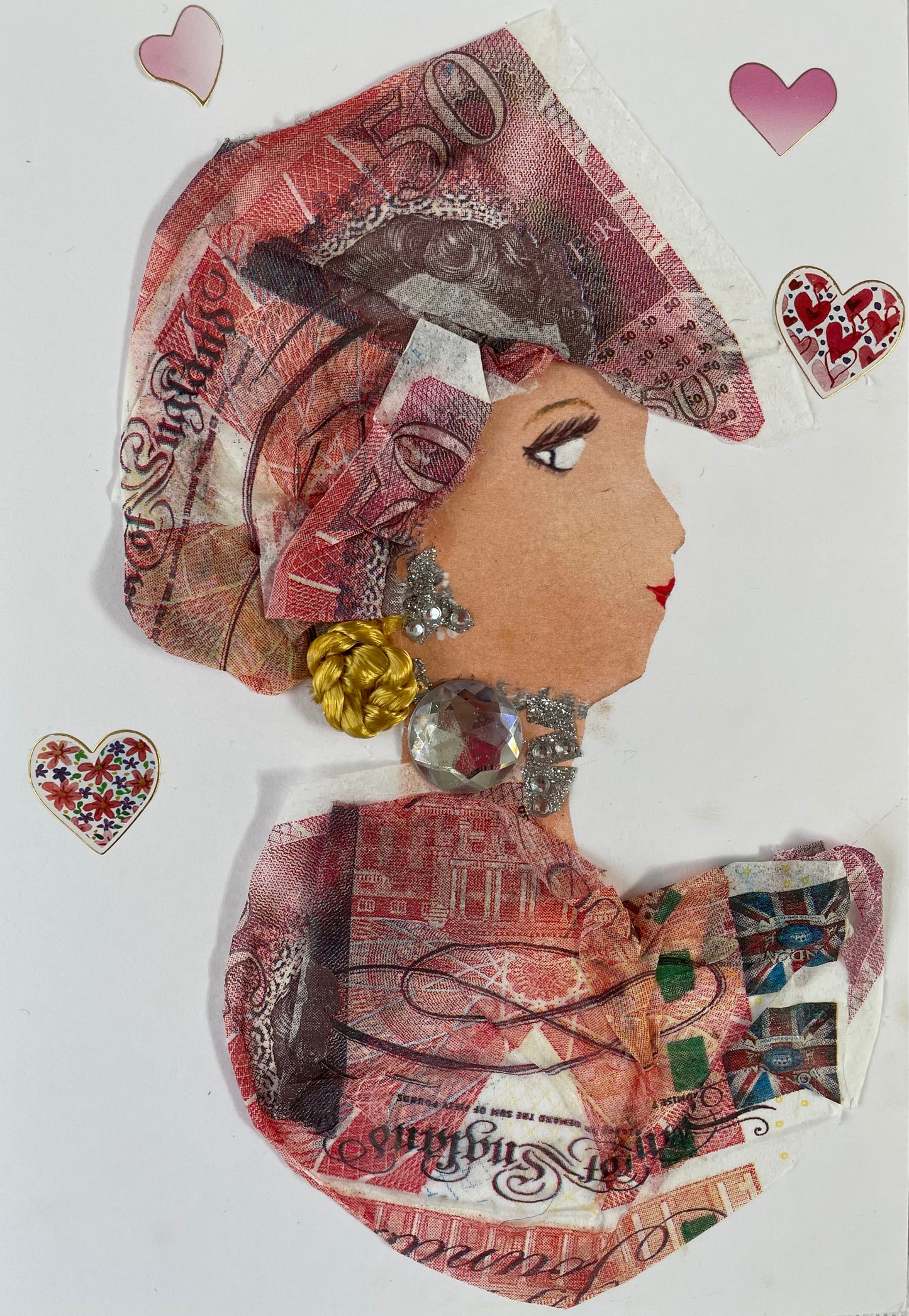 I designed this card of a woman named Mish Marble. She has a white skin tone and wears a money print hat. She wears a matching money print blouse. She wears silver jewellery. In the background there are four pink and heart hearts.