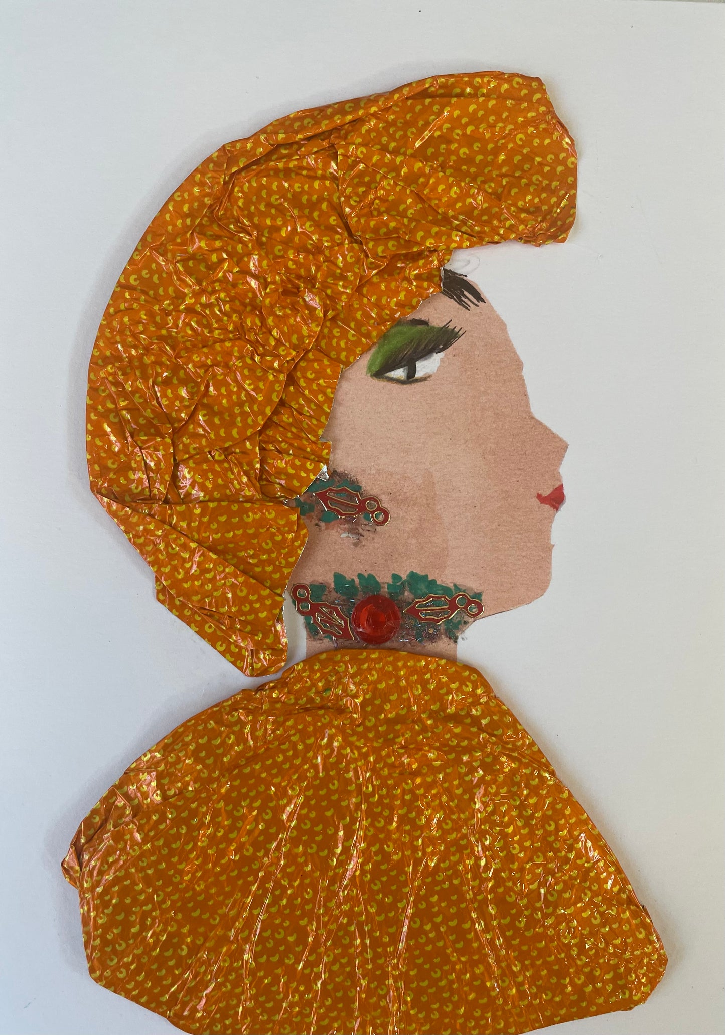 I designed this card of a woman named Orange Opportunity. She is wearing a yellow/gold shiny blouse with a matching headpiece. She compliments it with matching red and green earrings and necklace.