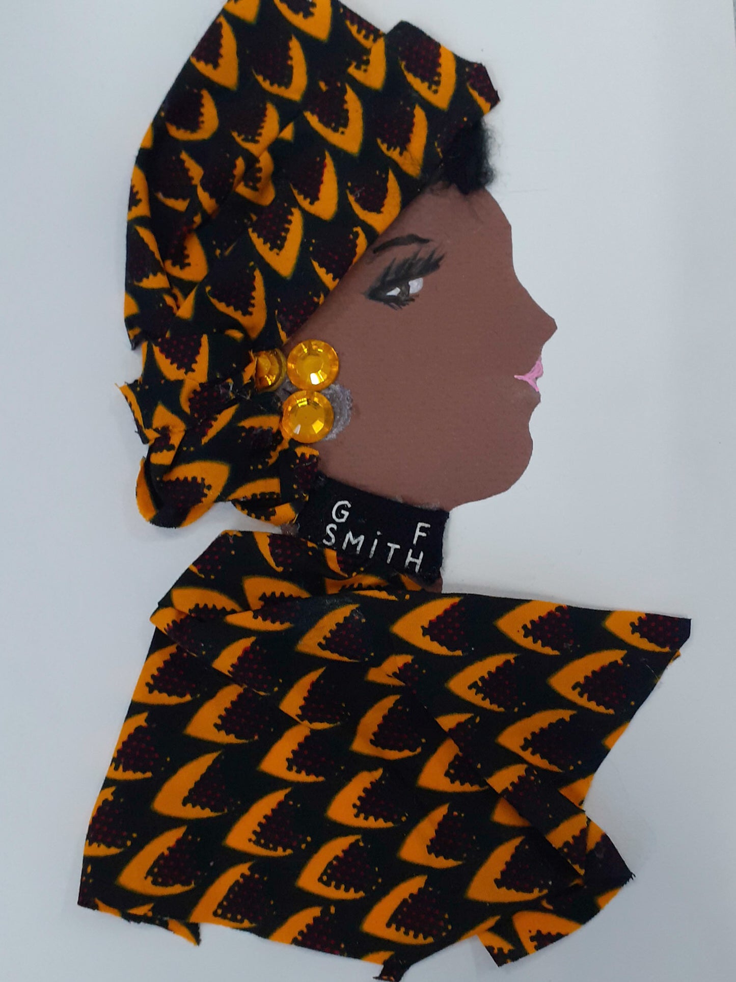 This card is called Doctor GF Smith. She wears a patterned orange headdress and blouse which match.