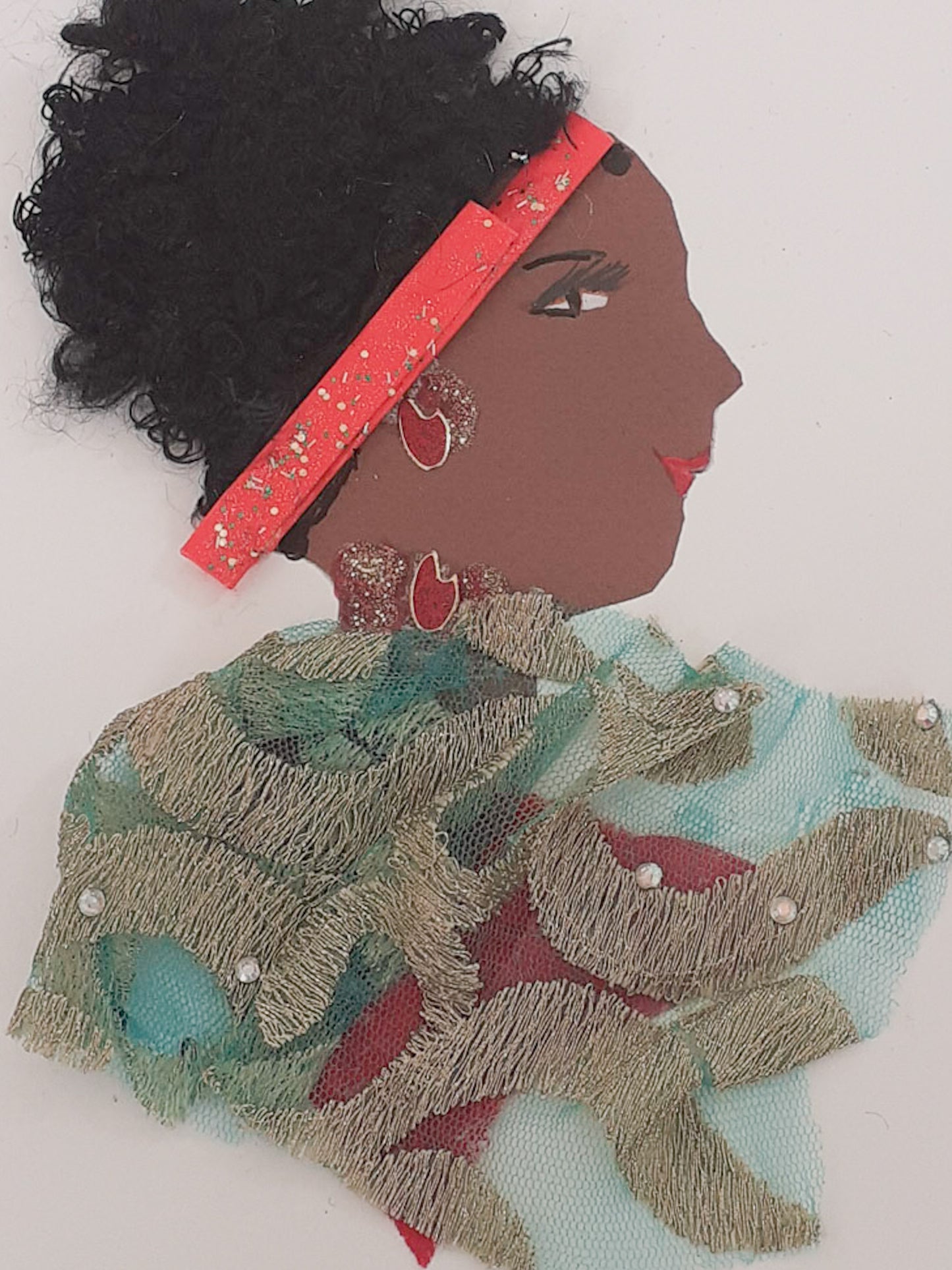 This card is of a woman named Tiffany. Tiffany wears a blue chiffon material blouse with embroidery on it. In her black curly hair, she wears a bright red headband.