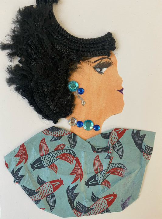 I designed this card of a woman named Teresa Blue. She has a white skin tone and she wears a blue fish print blouse. She wears blue gem jewellery.