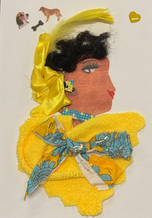 Handmade greeting card that doubles as a piece of art featuring a side-profile collage of a woman wearing a large yellow ribbon tied into her hair. She is dressed in textured yellow clothing, with layered materials and a patterned bow detail that adds dimension to the outfit. The bright yellow tones dominate the composition, creating a cheerful and cohesive look. Above her head to the left, small dog stickers are placed alongside a tiny yellow heart, introducing a playful and whimsical element. 