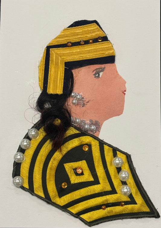Handmade greeting card that can double as a piece of art, featuring a side-profile mixed media collage of a woman wearing a structured gold and black geometric headdress with layered trim and gold studs. She has dark curled hair, pearl earrings, and a matching pearl-accented garment. The background is plain white, emphasizing the bold contrast of gold, black, and pearl textures.
