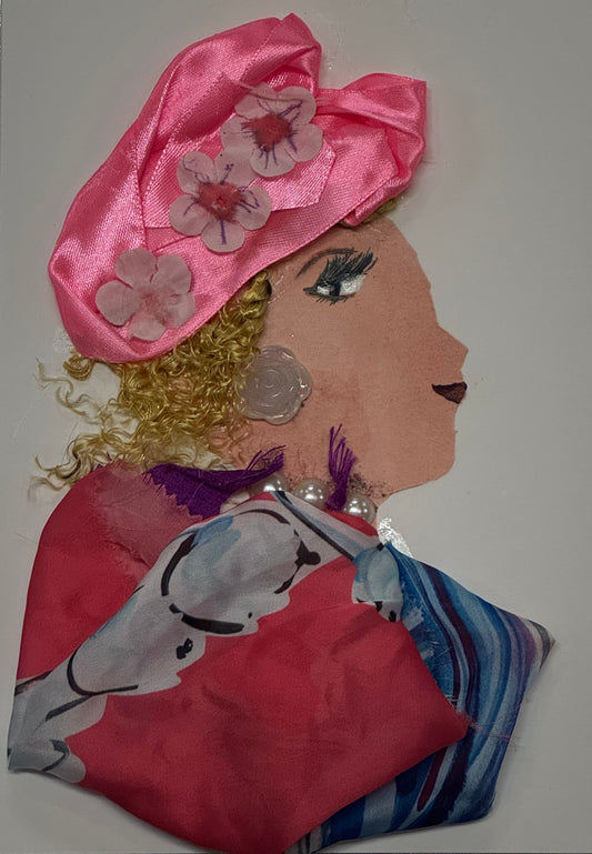 Handmade card that can double as a piece of art featuring a stylish woman with curly hair wearing a large pink hat decorated with flowers. She wears a soft pink satin outfit with a flowing scarf and pearl jewelry. The background is light and minimal, highlighting the delicate floral details and elegant spring theme.