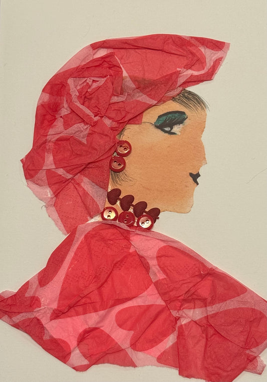 A side-profile collage portrait of a woman facing right, with warm-toned skin and a headscarf made of sheer red fabric layered with visible folds. Her outfit continues the red theme, featuring a pattern of large, soft-edged heart shapes. She wears red button-like earrings and a necklace made of small red heart embellishments. Her eye makeup is bold with dark liner and green shadow, and her lips are a deep red. The textures include crinkled sheer fabric and smooth button details.