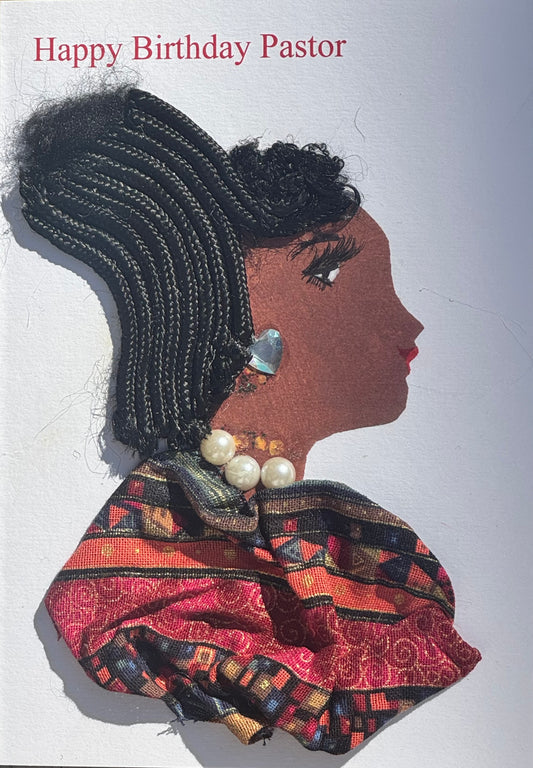 Handmade greeting card that can double as a piece of art featuring a womans  profile depicted with black braided hair detail worn in an updo. Shes also shown wearing pearl jewelry as a necklace, and a shinny silver earring in a shape of a heart. Her blouse is a patterned fabric garment, made up of red, orange, light blue, and black hues in different shapes. Above her head, theres also a “Happy Birthday Pastor” text toward the left side of the card. 