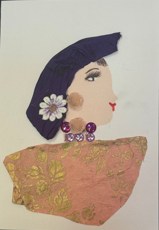 Handmade greeting card that can double as a piece of art featuring a side-profile collage of a woman with a purple headwrap, wearing a peach-toned outfit with gold patterns, decorated with flower and gem embellishments near her ear.