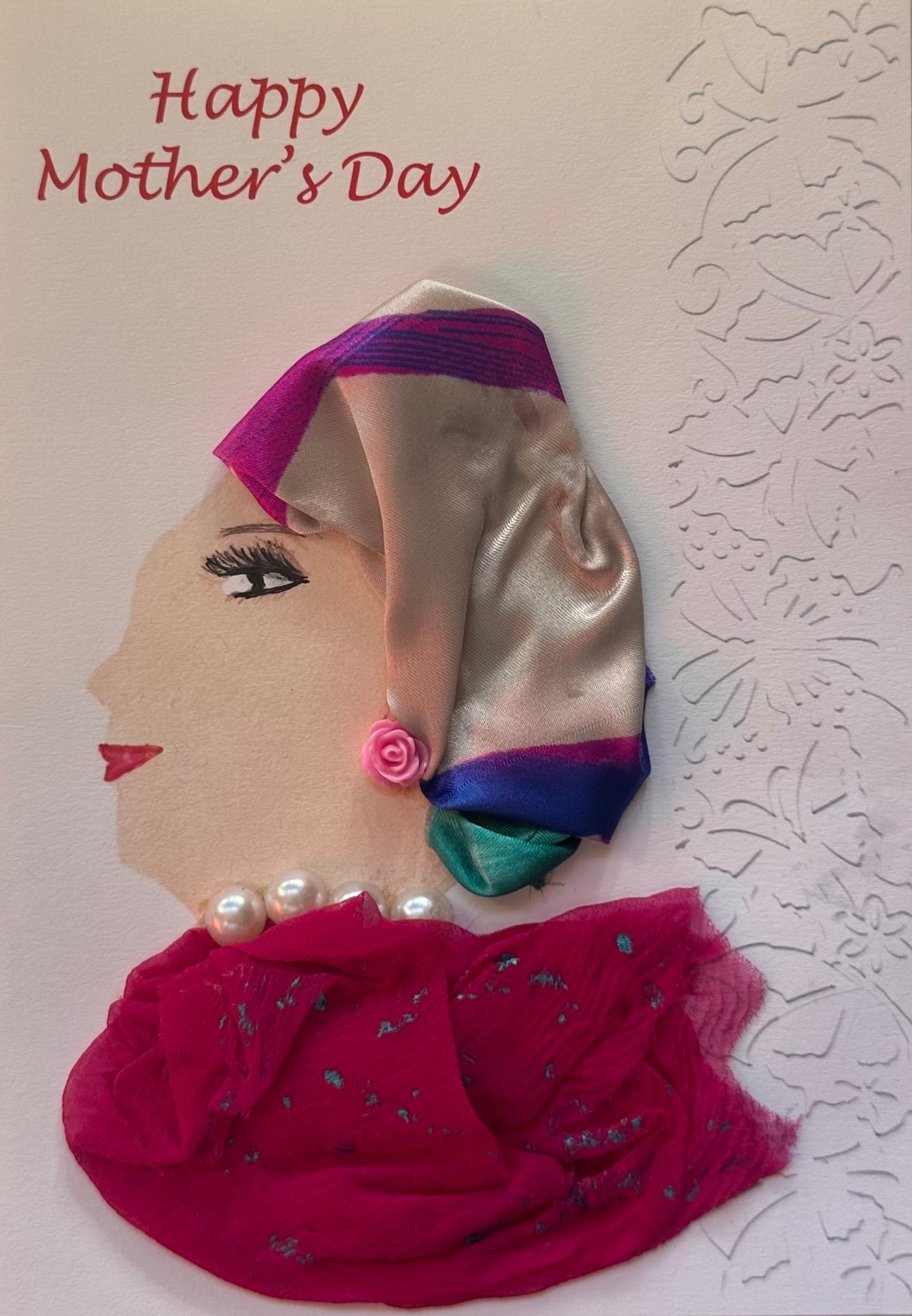 Card with a decorative headscarf design and 'Happy Mother's Day' text on a textured background
