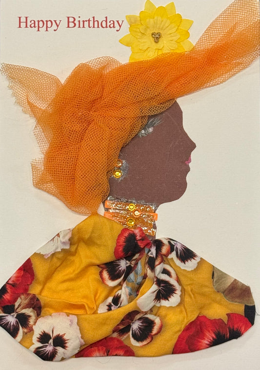A pict



Handmade greeting card that can double as a piece of art featuring a side-profile collage of a woman wearing a large orange mesh hat with a yellow flower decoration. She has a floral-patterned outfit in warm tones and gold-toned jewelry. The composition emphasizes bright oranges and yellows.