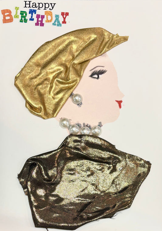 A woman wears a gold headwrap and a darker gold blouse. She wears a pearl earring and necklace. In the top right, "Happy Birthday" is spelt out in bright letters. 