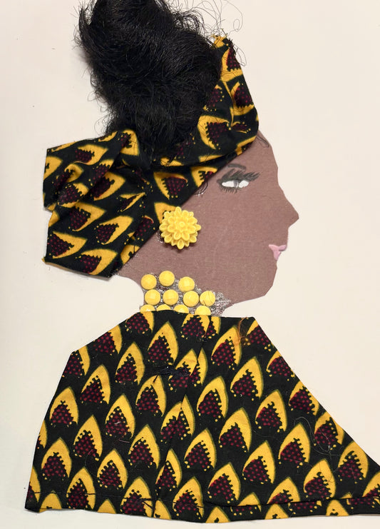 A woman wears a kente patterned headwrap and blouse with black, red, and yellow. She wears a large yellow flower earring and a necklace made of yellow gems. 