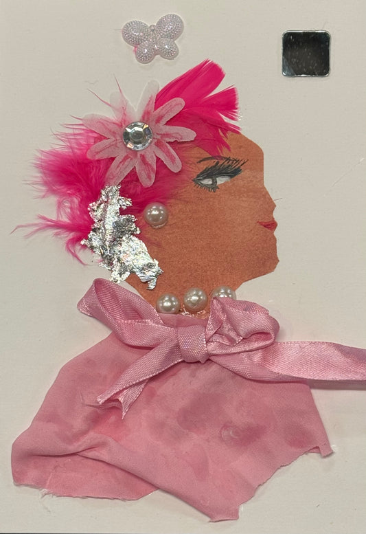 A side-profile mixed media collage of a woman with medium brown skin tone against a plain white background. She wears a sheer pink fabric garment tied into a bow at the neck, with visible soft folds and slight transparency. Around her neck and ear are pearl embellishments forming a necklace and earring. Her head is adorned with a decorative arrangement of bright pink feathers, a layered pink fabric flower with a central rhinestone, and additional small embellishments including a butterfly-shaped gem above.