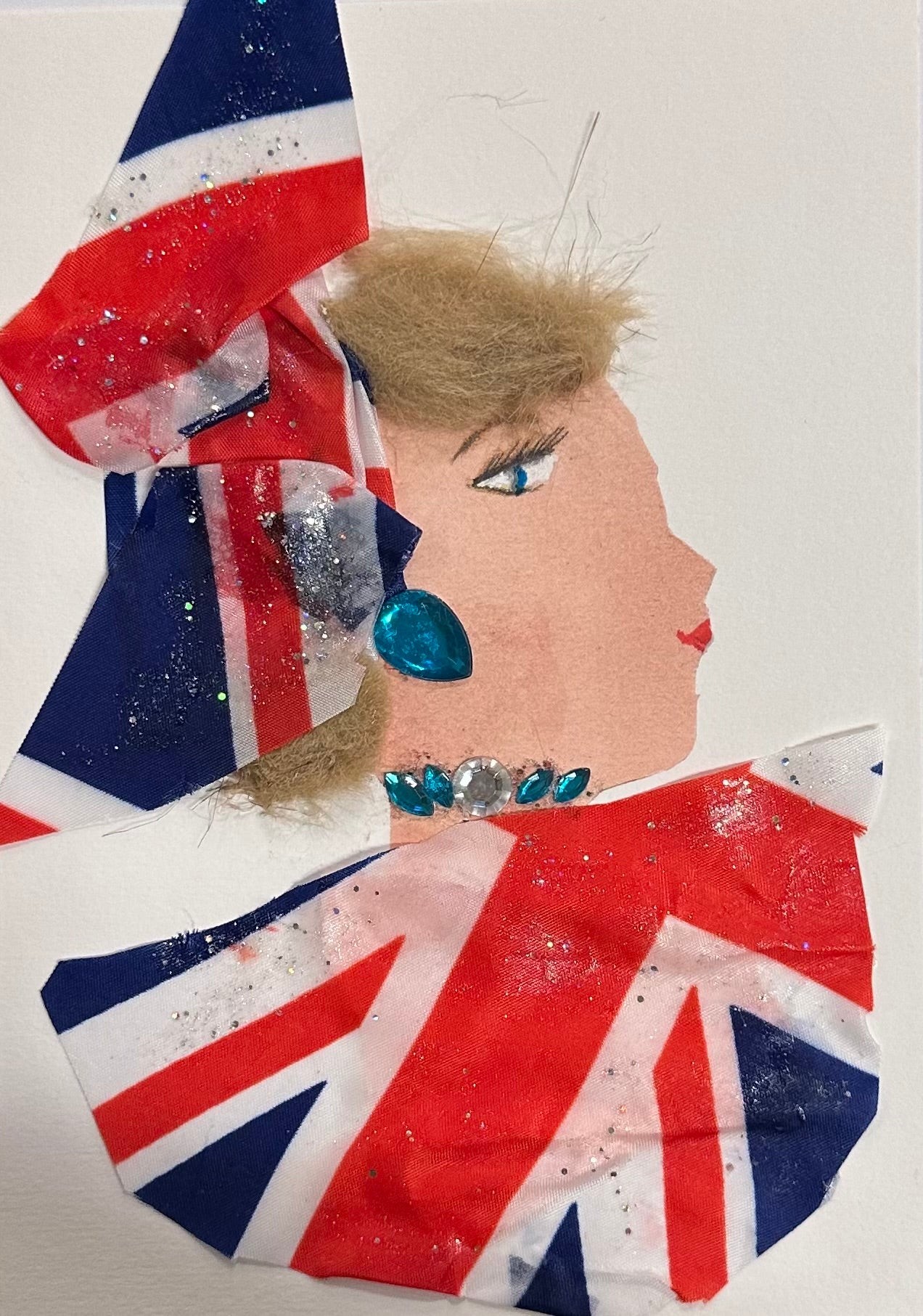 A handmade collage portrait of a woman named Elizabeth Lilibeth, featuring Union Jack fabrics for her clothing and headpiece, turquoise gemstone jewellery, and soft golden hair, all arranged to create a refined and patriotic British aesthetic