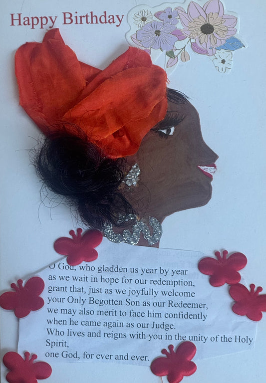 A handmade birthday card showing a smiling woman in profile wearing a large red fabric headwrap tied into a bow. She has sparkling rhinestone earrings and a layered silver rhinestone necklace. Her hair peeks out beneath the wrap. The background includes floral stickers and a printed birthday message at the bottom. Red flower stickers decorate the lower corners.