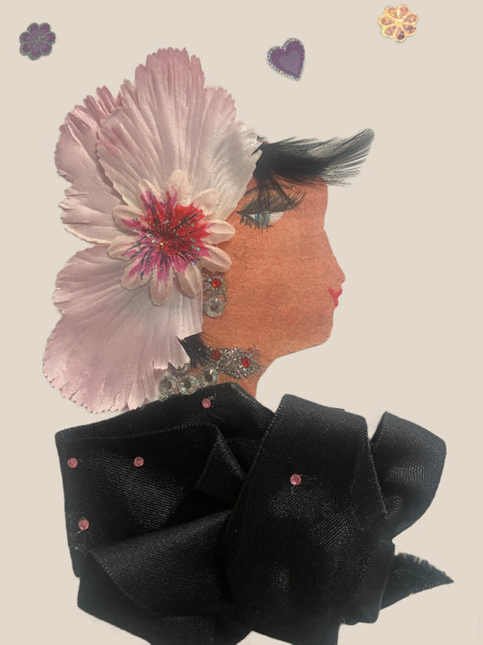 This is a handmade card of a woman named Finchley Road Fareen. She wears a large pink floral headpiece, dramatic black lashes, silver earrings, and a voluminous black ribboned collar. Background stickers include a purple heart, a purple flower, and a golden floral sticker.