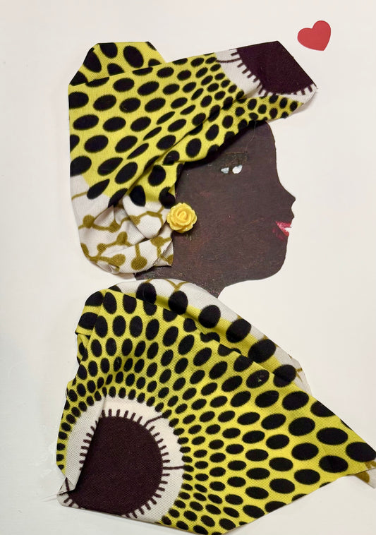 A woman wears a matching ankara patterened headwrap and blouse. The pattern features a bright yellow with dark polkadots and circles. She has a yellow rose earring. There is a red heart in the top right of the card. 