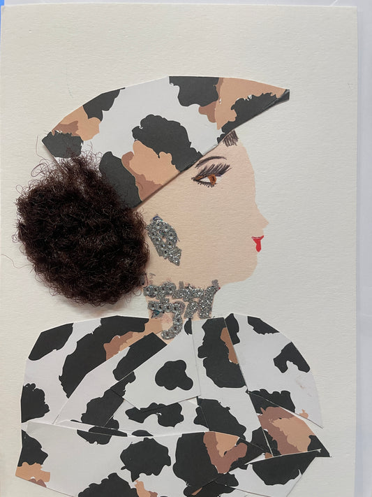 This is a handmade card of a woman named Tottenham Teah, wearing a layered black and white outfit, a high coiled bun, silver earrings, and a decorative silver necklace.
