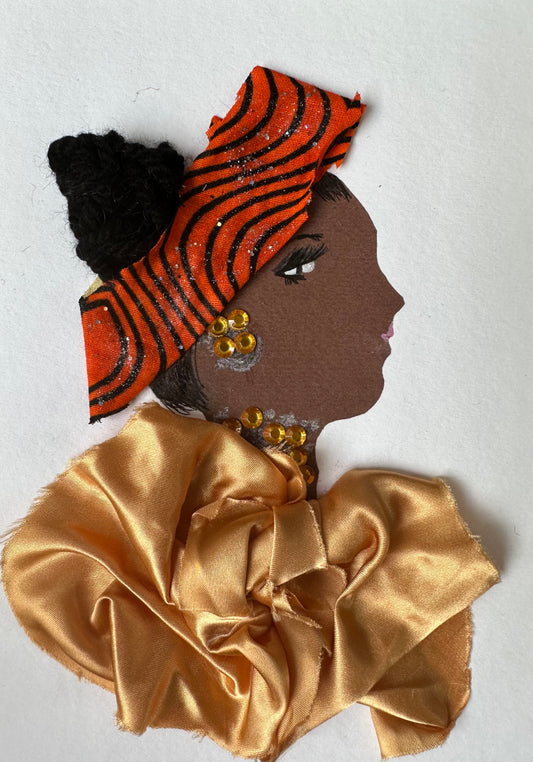 I designed this handmade card of a woman dressed in a butterscotch coloured silk blouse. Her hair is held with a orange and black striped cloth, and she is wearing gemstone earrings and necklace that match the colour of the blouse.