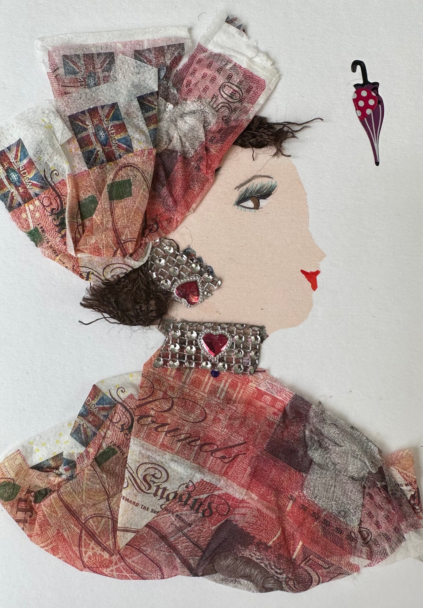 I designed this handmade card of a woman dressed in a 50 pound printed blouse. The red colour in the blouse and hatinator is complemented with silver and red heart gemstone jewellery. 
