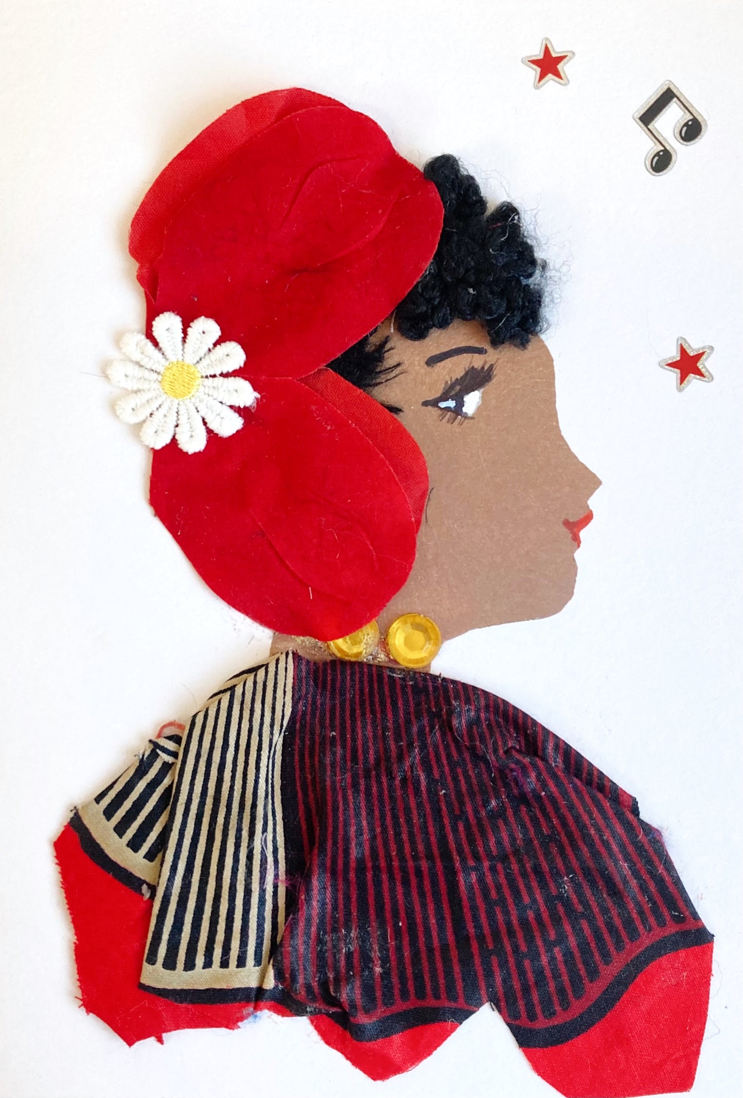This card is of a woman given the name Davina. She wears a dress patterned with red, black, and white. Her necklace is yellow gemstones. In her black curly hair, she wears a flower petal headpiece which has a white daisy on it. In the background, there are music notes and stars in the background. 