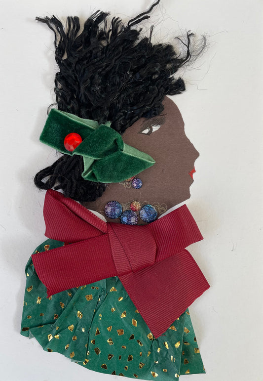 I designed this card of a woman named Molly Manor. She has a black skin tone and is wearing a green blouse with gold patterned confetti. She is wearing a big, dark red bow with a purple necklace and a matching set of earrings. She has a dark green ribbon in her hair accompanied by a red jewel. 