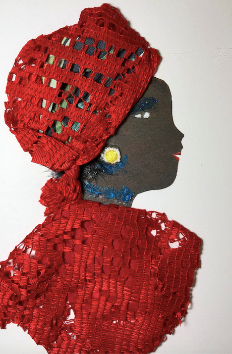 This card has been given the name Emily Grace. She wears a red netted material with a green nature pattern peaking out from underneath. Her earring is a small yellow circle.