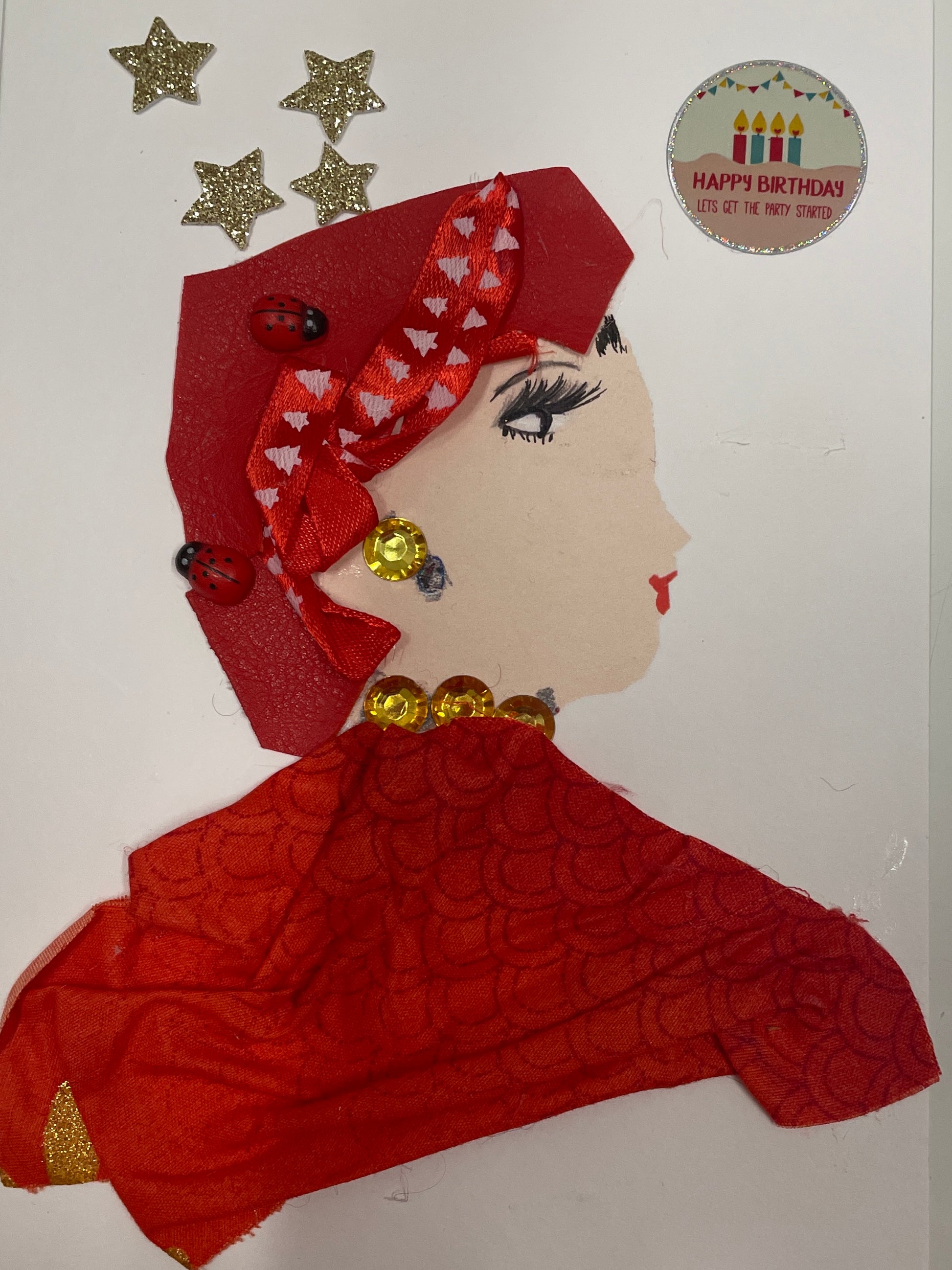I designed this card of a woman who is named Pepper Peckham. She has a white skin tone and wears a hat that is red with two red lady bugs and a red ribbon tied on the front. She is wearing a red blouse with gold jewellery. Above her head there are four gold sparkly stars. It also says "happy birthday lets get this party started" above her head as well.  