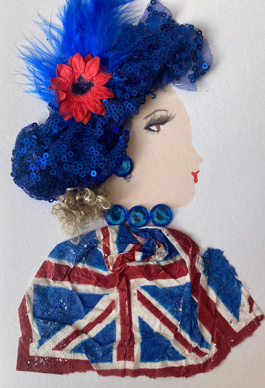 I designed this card of a woman named Brilliant Britney. She has a white skin tone and is wearing a blue sequence head warp that has blue feathers and a red flower in the middle. She wears a London flag print blouse with blue gem jewellery.