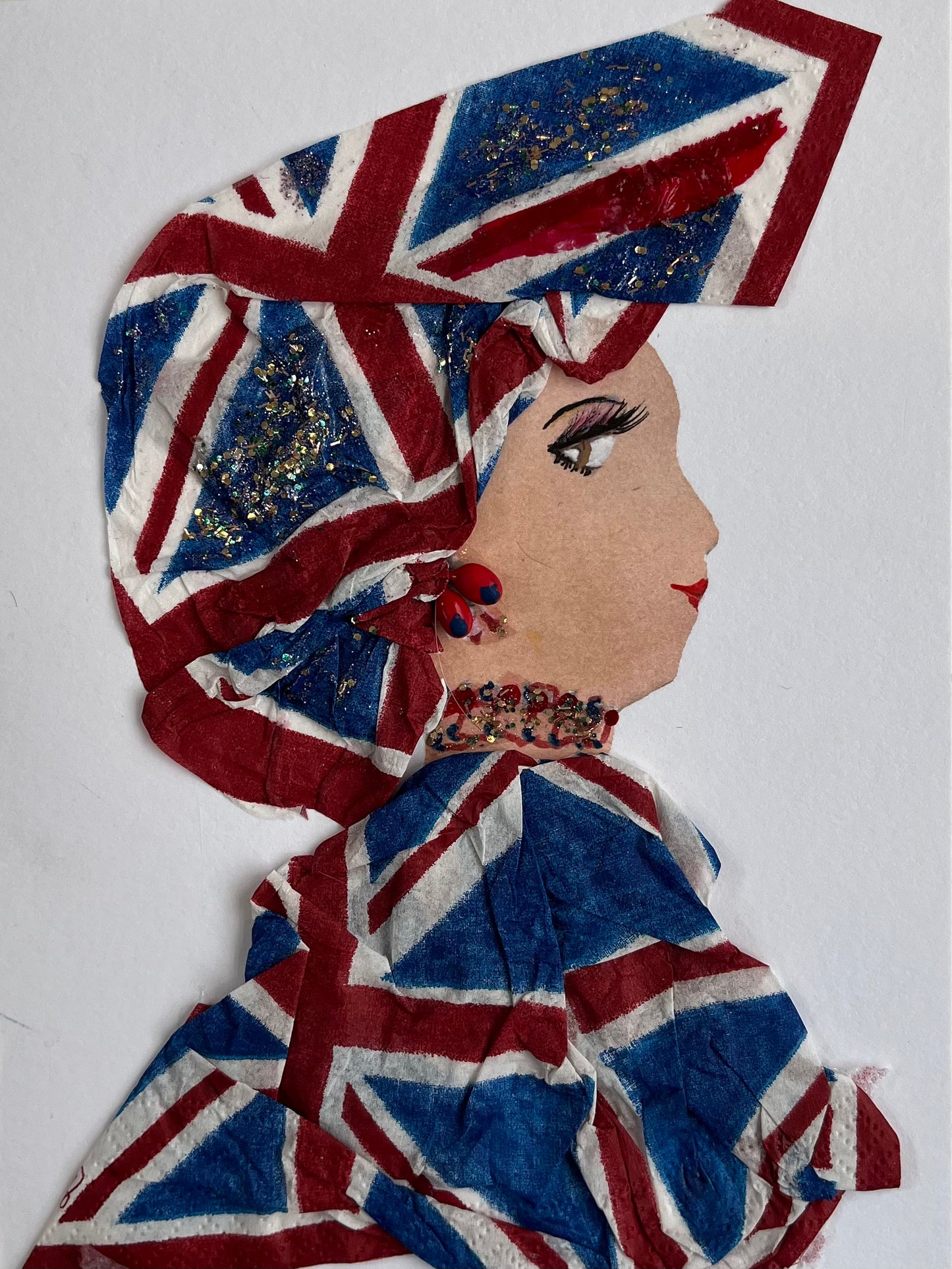 This card shows a woman wearing a matching headscarf and dress which has the UK flag pattern on it