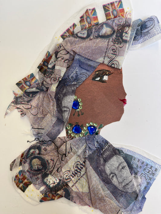 This card has been given the name avery, and she wears a matching headdress and blouse made of a money fabric. She wears blue and green gem jewellery.