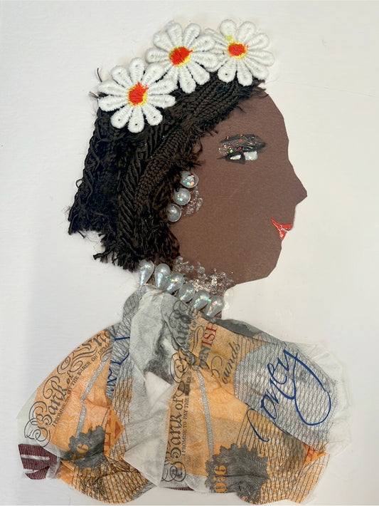 This card has been given the name Preston Pound. Preston wears a blouse made of money fabric, and a pearl necklace. In her short, braided hair, she wears three white daisies. 