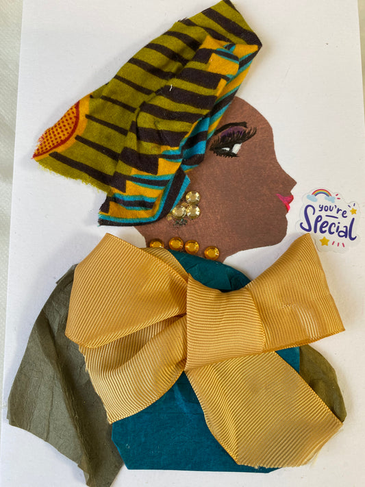 I handmade this card of a woman named Sea Salted Sugar. It shows her in profile with brown textured paper skin, bold makeup, and a vibrant green-and-yellow headwrap. She wears gold gem earrings, a row of matching embellishments around her neck, and a large golden bow over teal and olive fabric. A sticker beside her reads, "You're Special."